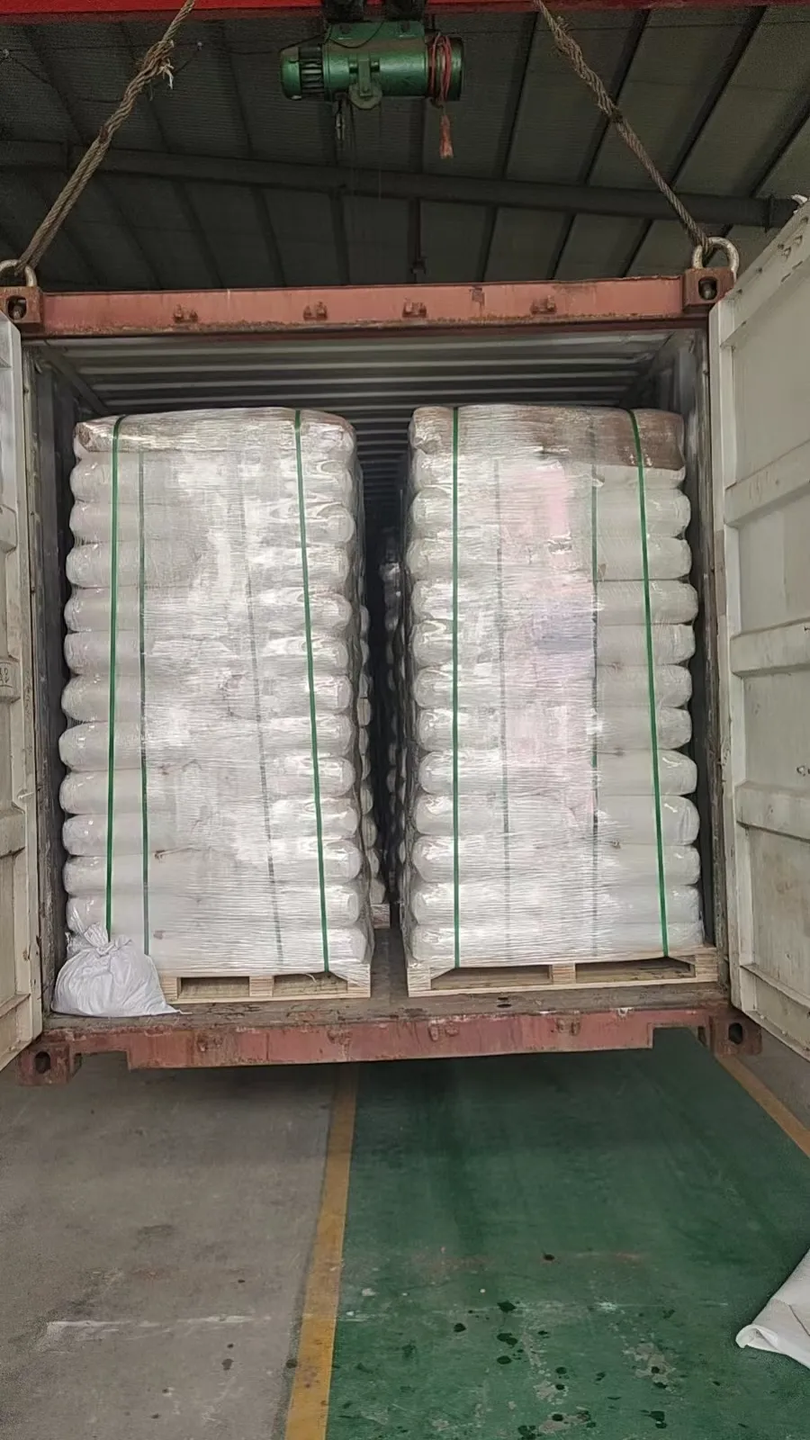 Bulk packaged HPEG monomer bags loaded inside shipping container for export and industrial chemical transportation