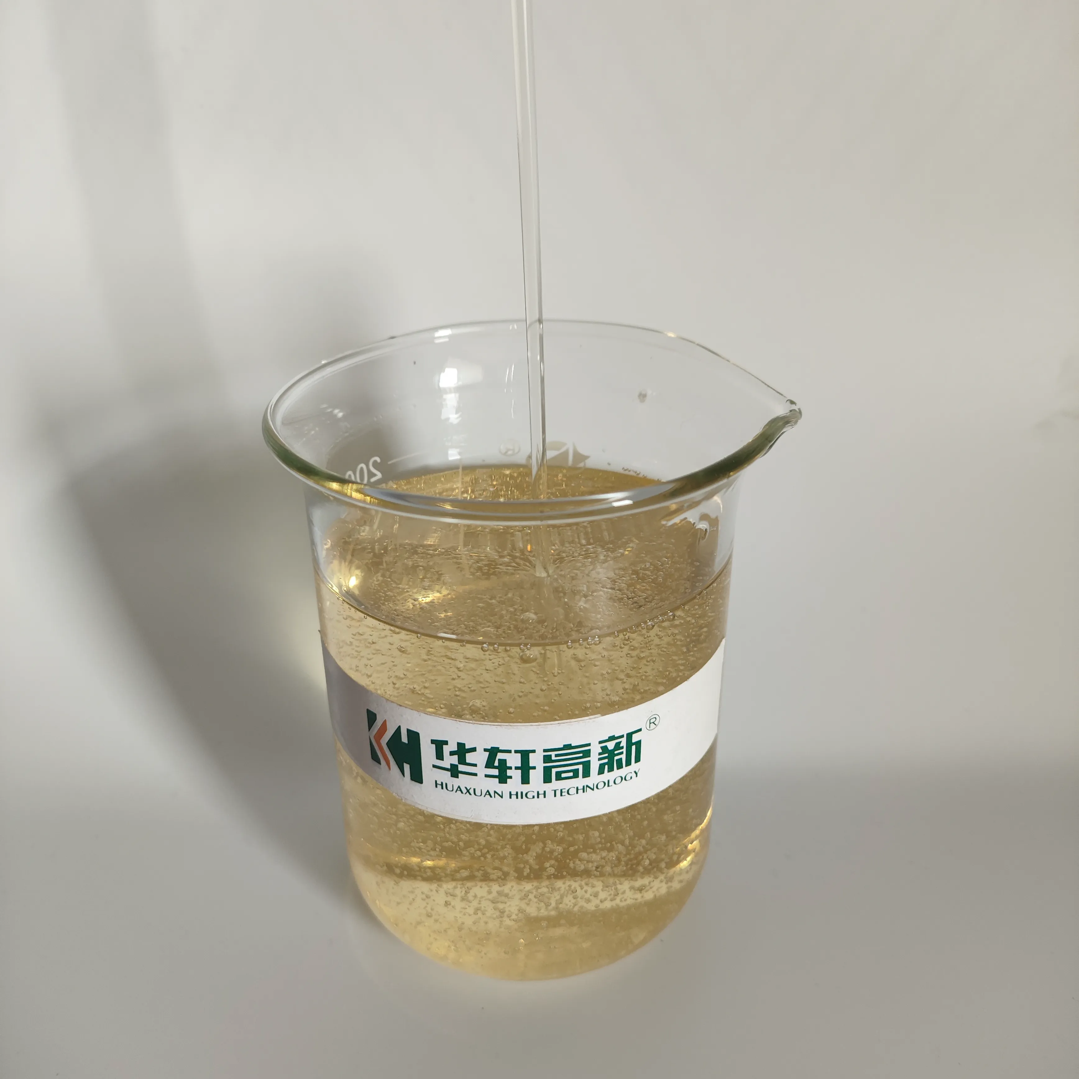 KH-ZNJ concrete viscosity modifying admixture liquid sample showing viscous flow and microbubble dispersion in laboratory beaker