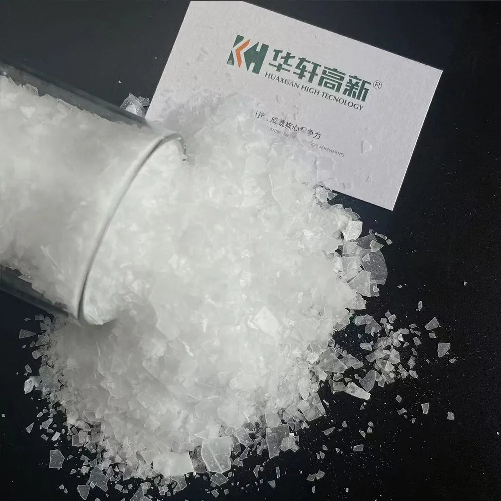 EPEG polyether monomer crystal flakes poured from glass container for polycarboxylate superplasticizer production