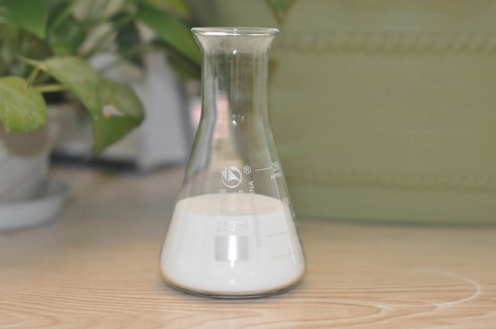 KH-P601 defoamer solution sample in laboratory flask