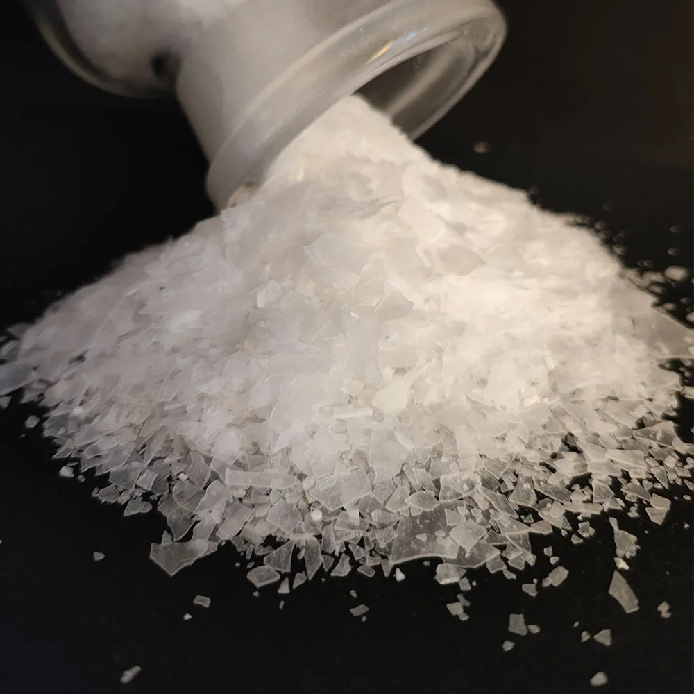 Polycarboxylate superplasticizer monomer flakes poured from sample container