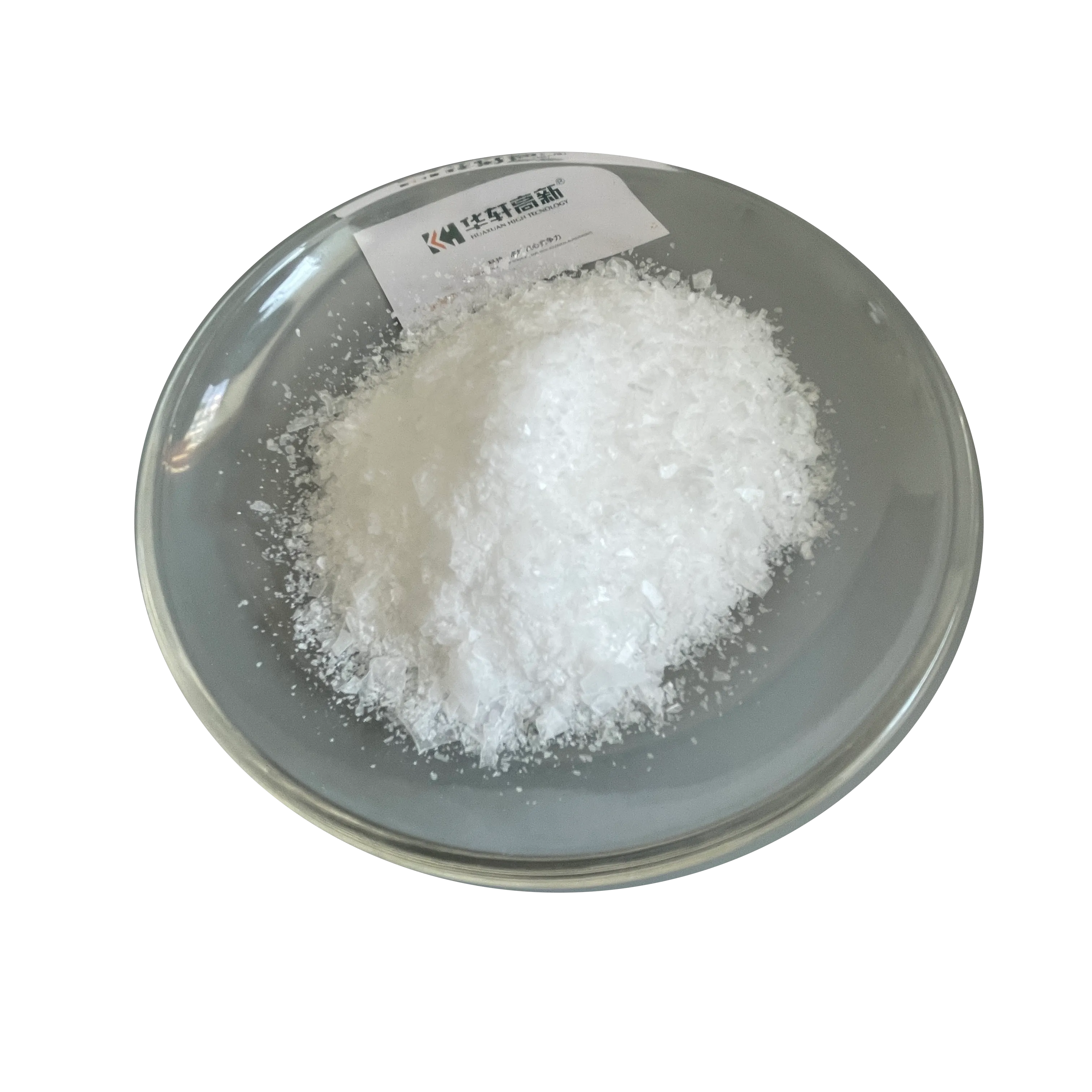 White TPEG polyether monomer flakes in glass dish for polycarboxylate superplasticizer production